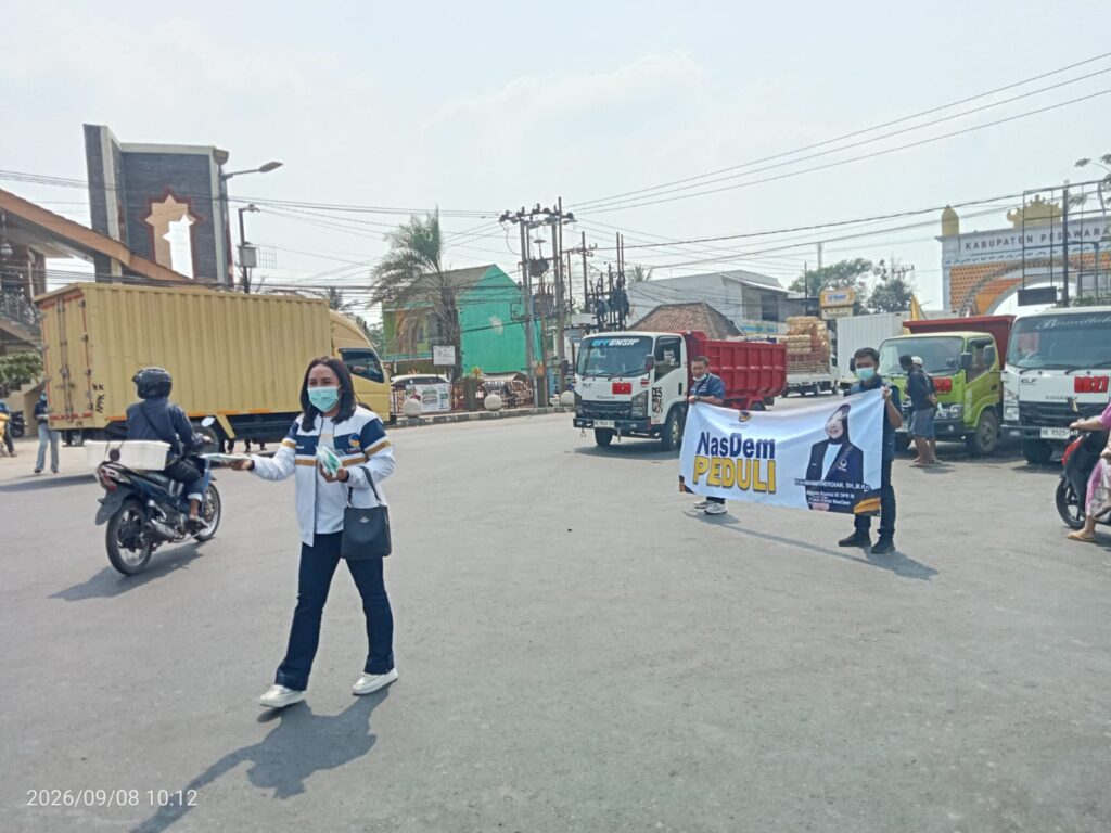 IMG-20260908-WA0000-1024x768 DPD NASDEM PESAWARAN BAGIKAN 22.000 MASKER UNTUK PENGENDARA TERDAMPAK ABU VULKANIK